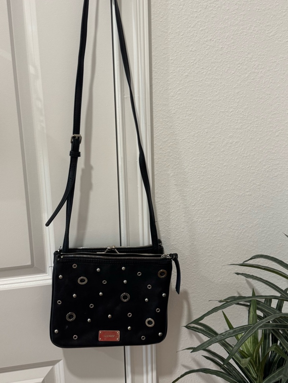 Black Studded Crossbody Bag with Grommet Detail